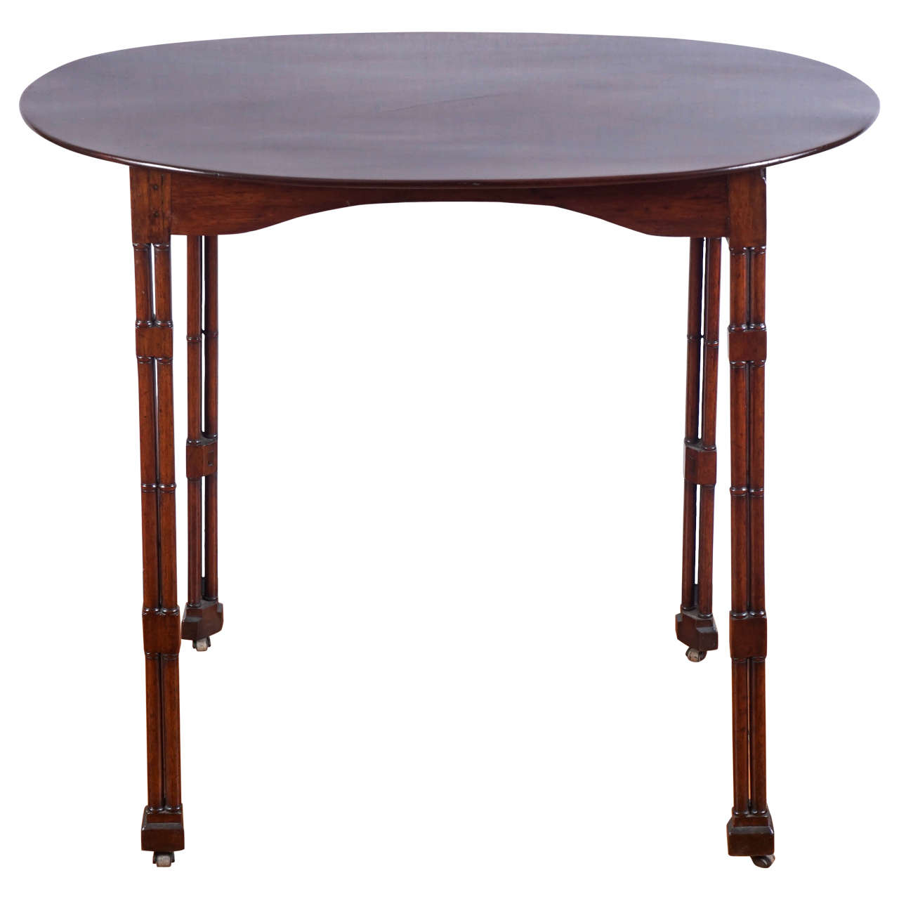 Regency Oval Topped Mahogany Side Table on Casters For Sale at 1stdibs