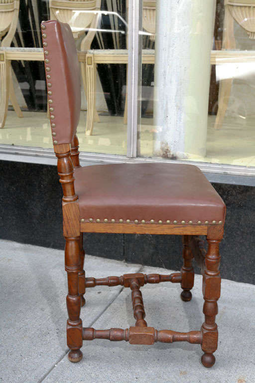 Danish Set of Ten Leather and Oak Dining Chairs For Sale