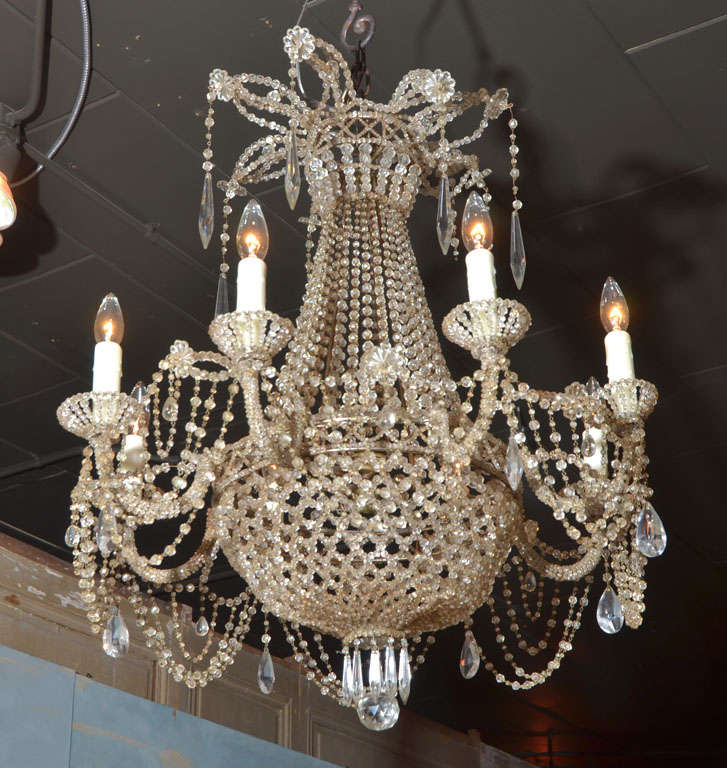 Beautiful Italian crystal chandelier. Beading in basket design. Has been wired for the USA.