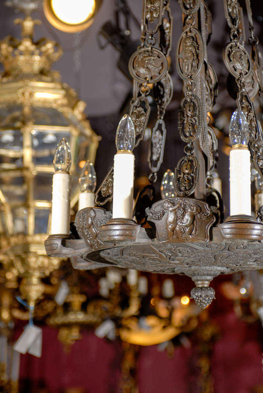 20ième siècle Lustre ancien Lustre en bronze très inhabituel en vente