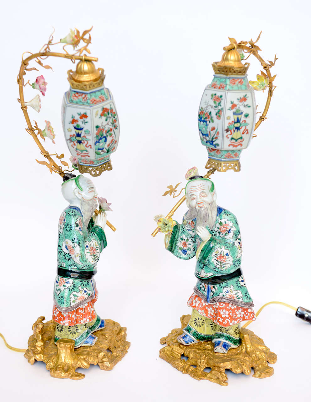 Pair Of Chinese Porcelain Figurines Holding Up Lanterns 1