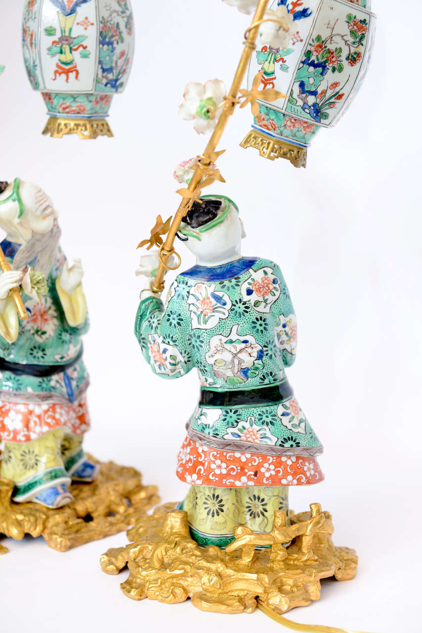 Pair Of Chinese Porcelain Figurines Holding Up Lanterns 4