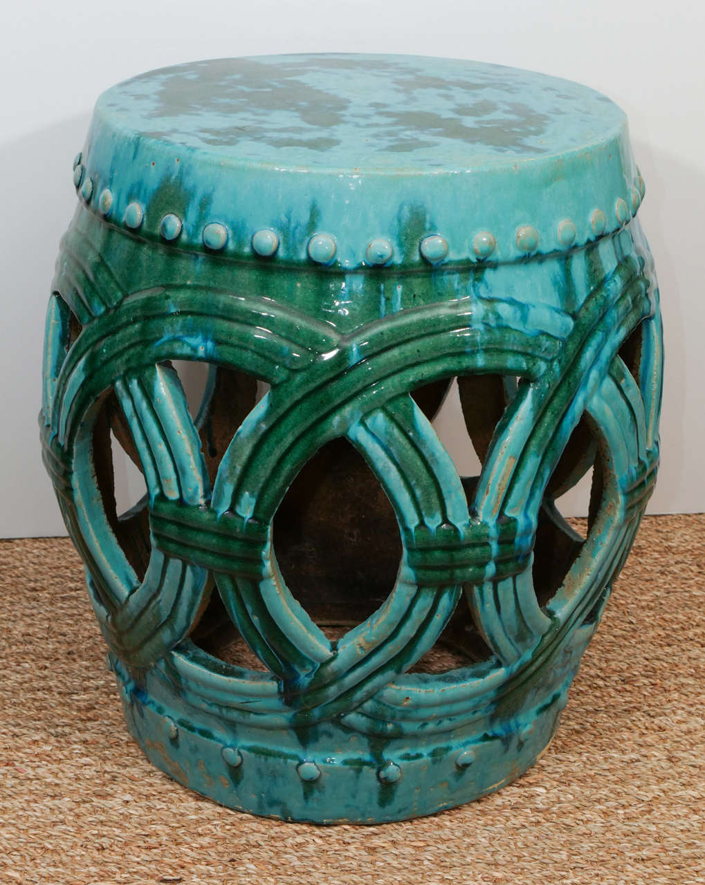 The color on these ceramic stools is what makes them special. In a beautiful green mixed with a stunning turquoise, these can go inside or out, used as extra seating or side tables.