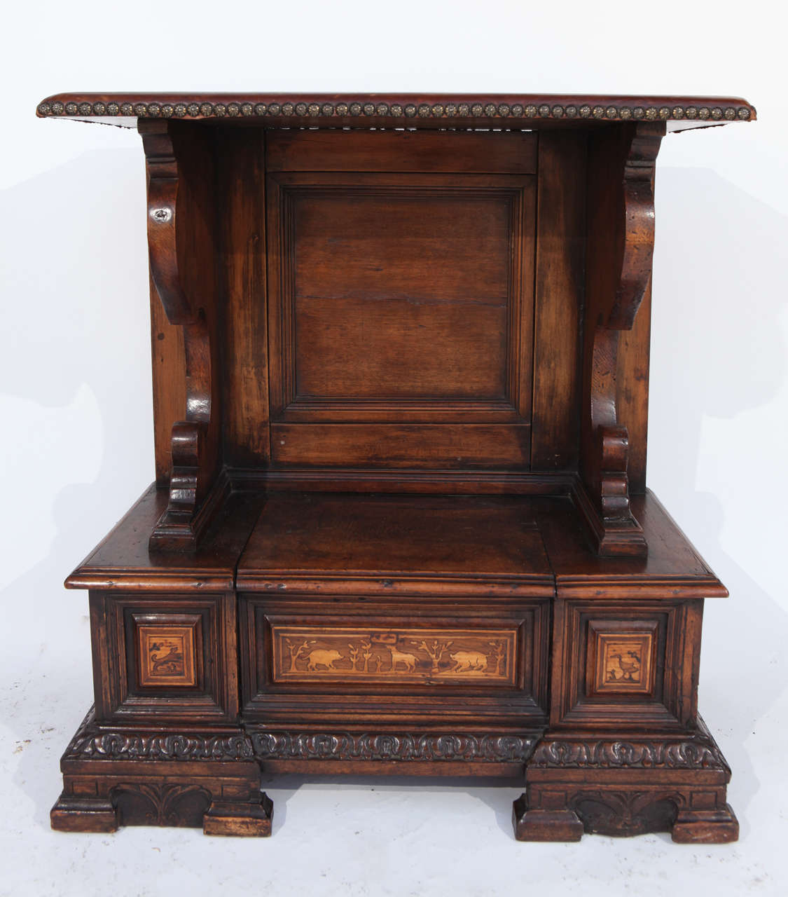 18th century Italian walnut cabinet with flip drawer and inlaid animal scene. The leather top with the nailheads is not original.