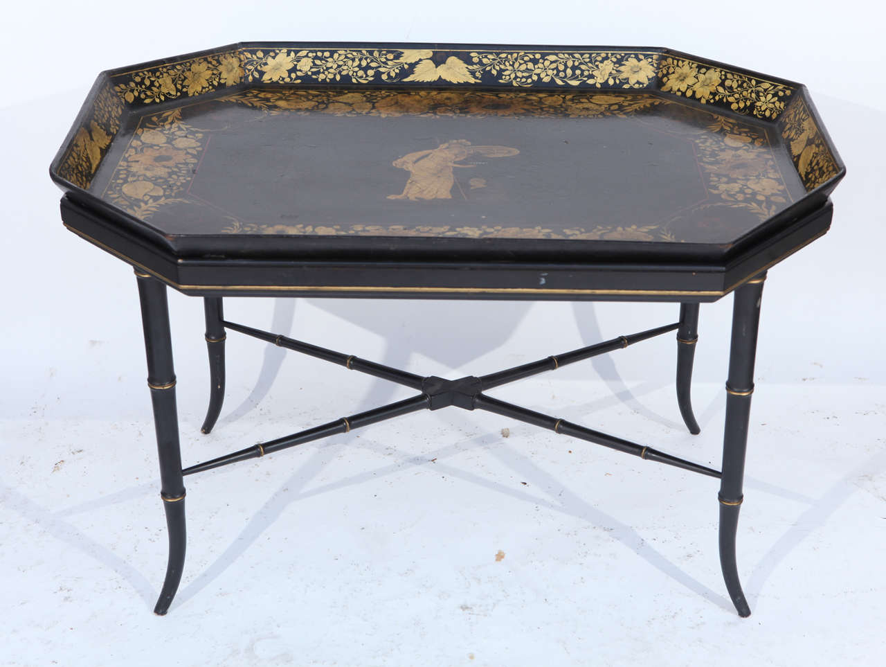 19th century papier mâché table on later stand. This tray has gilt details and a neoclassical motif. It is signed by the maker.