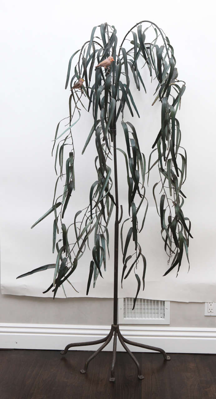 20th century Italian iron sculpture of tree with three birds. The sculpture is painted green. It can be used indoors or outdoors.