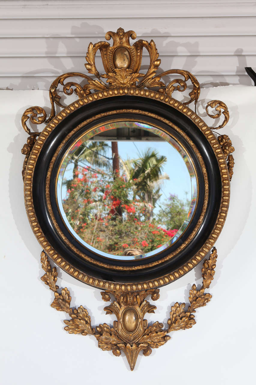 19th century English round gesso wire mirror.