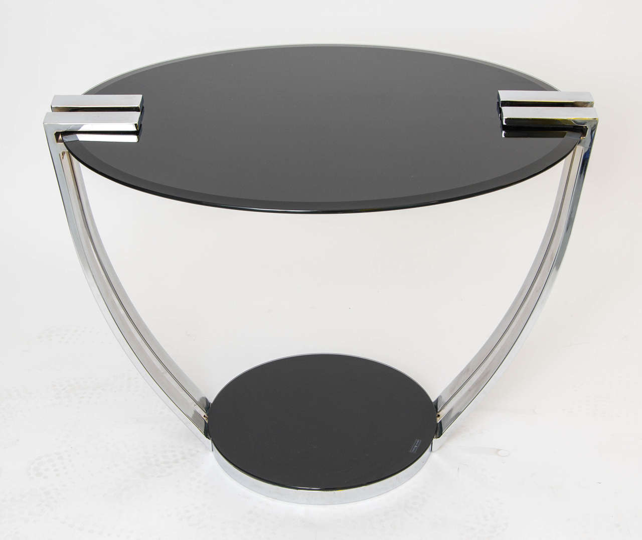 Coffee table deco style,designed by Josef Hoffmann, with black glass base and top and chrome structure, oval top and round base, prod. Germany, circa 1930.
Free shipping to London.