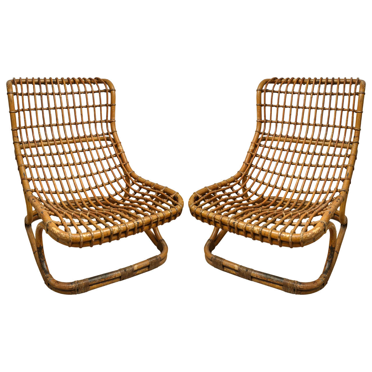 Pair of Rattan Lounge Chairs by Tito Agnoli