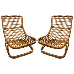 Pair of Rattan Lounge Chairs by Tito Agnoli