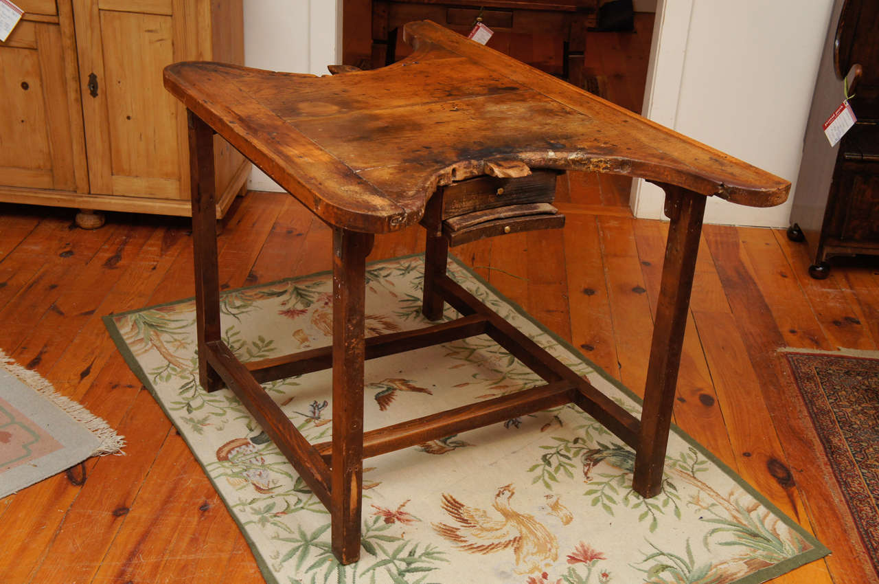  Okay, here it is!!! The most unusual, fun but functional, conversation piece of this container. You tell how much we love this piece BEFORE we describe it!! This 1870 English watchmakers table has two curved work areas at either end. Each work