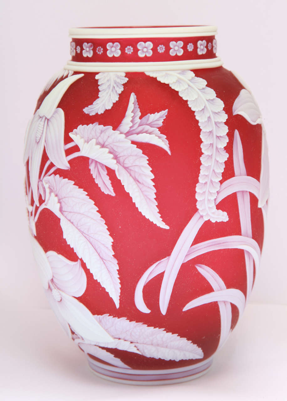 A rare and fine unsigned Thomas Webb & Sons red and white cameo glass vase,  deeply carved with flowers and leaves