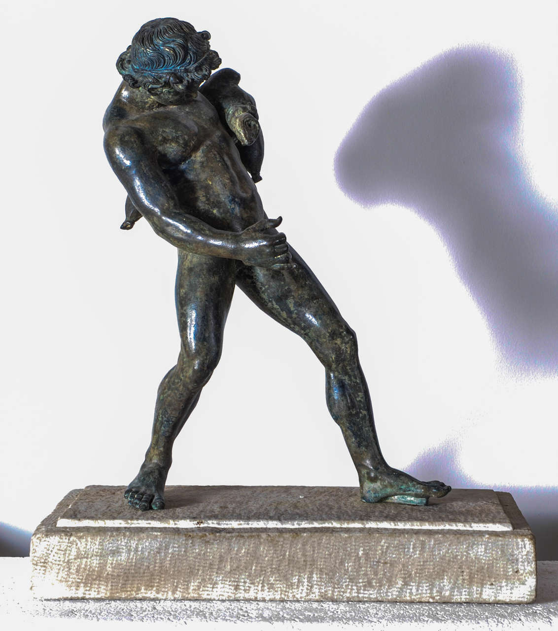 Neapolitan bronze figure of Dionysus after the antique, on a marble base. second half 19th century.