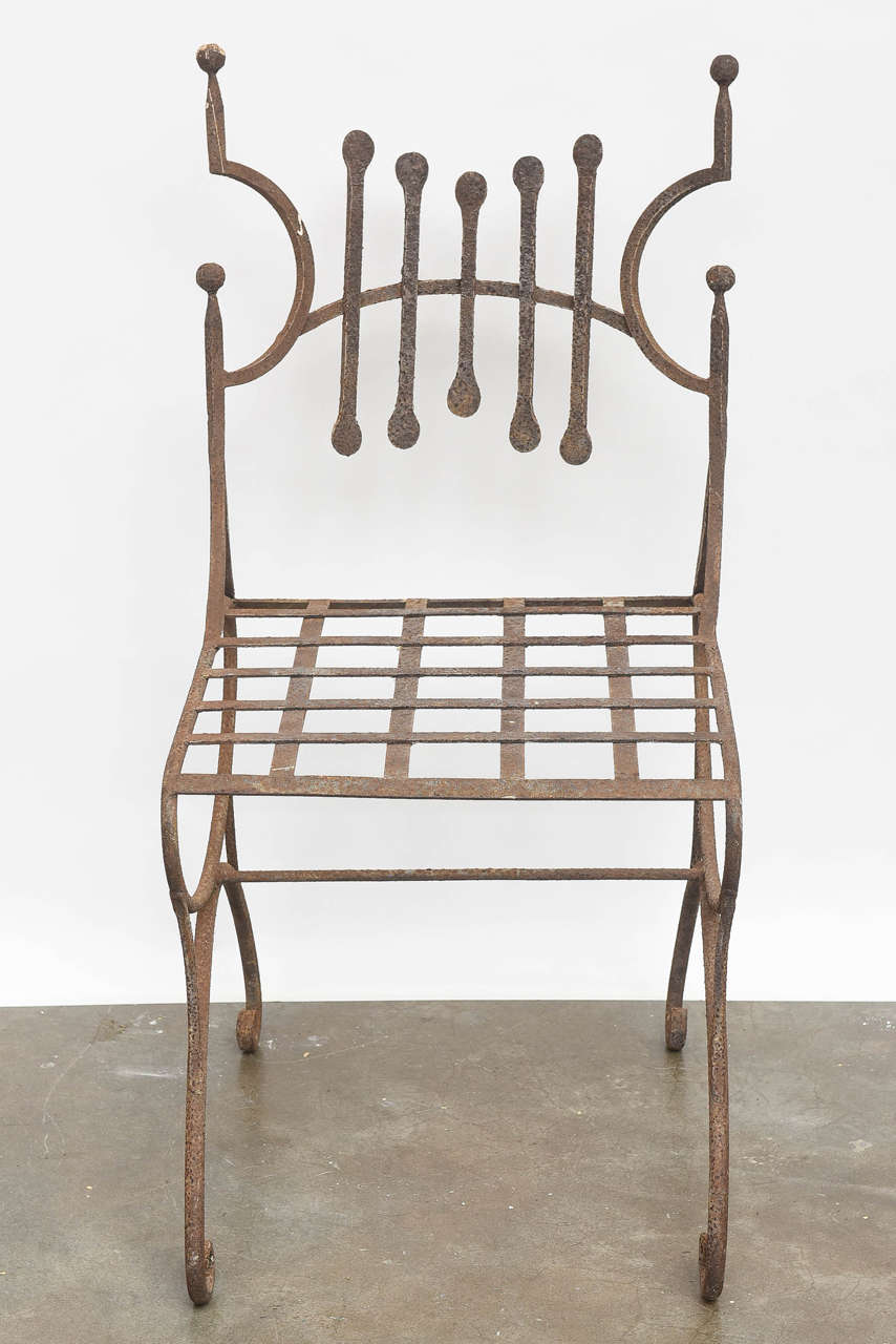 Unusual French hand wrought iron chair, circa 1950.