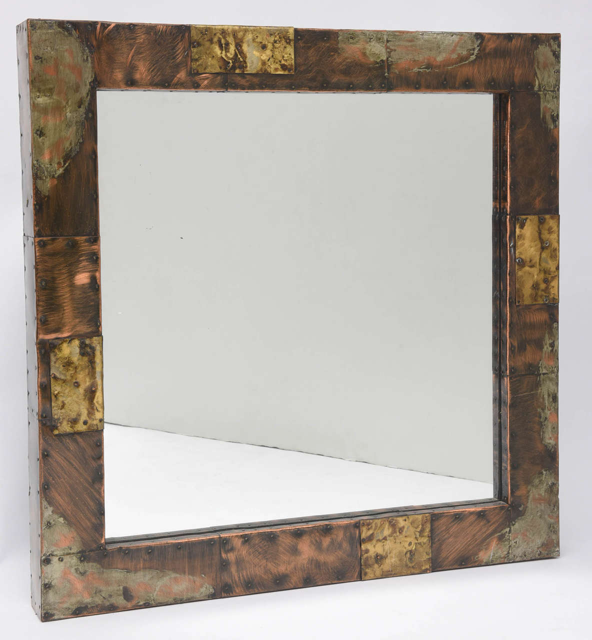 Paul Evans Mirror,PE 17,consisting of patinated and welded steel,brass,copper 
And pewter.