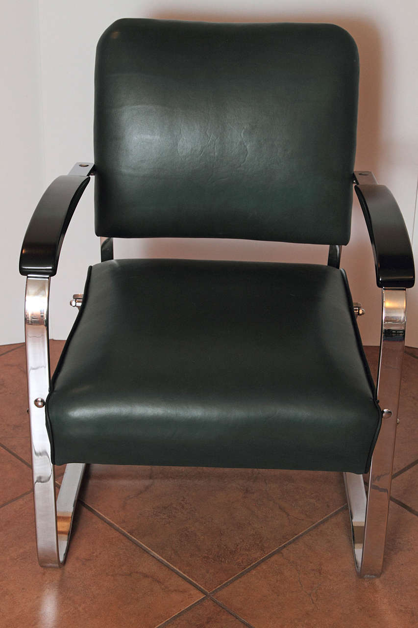 Excellent condition.
Original chrome, new calf-skin leather (in original green oil-cloth color) with black leather piping, re-lacquered arms. 
Studded upper back, per original, looks great from behind.
Salvatore Bevalacqua or Percival Goodman Art