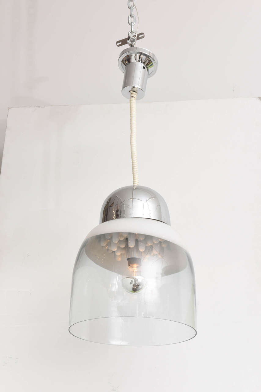 Italian 1960s light fixture with clear and white glass dome by Mazzega. The single socket is surrounded by textured glass resembling dripping water.