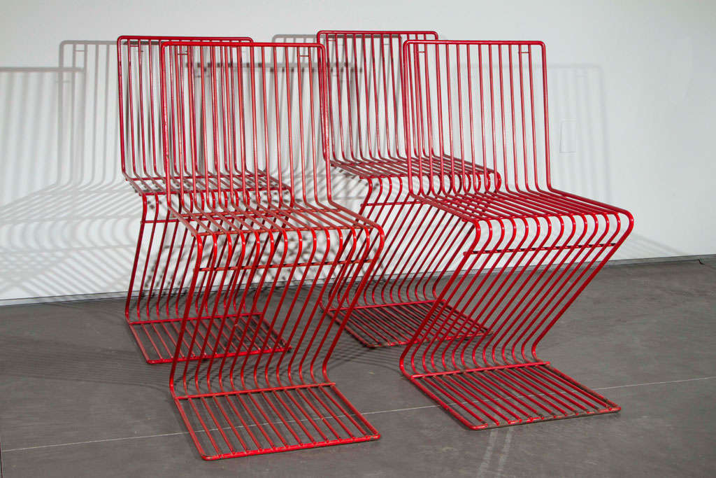 Set of four red François Arnal Z chairs.
Atelier A, France.