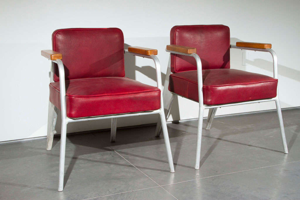 2 rare metal and leather chairs by Jean Prouvé. 