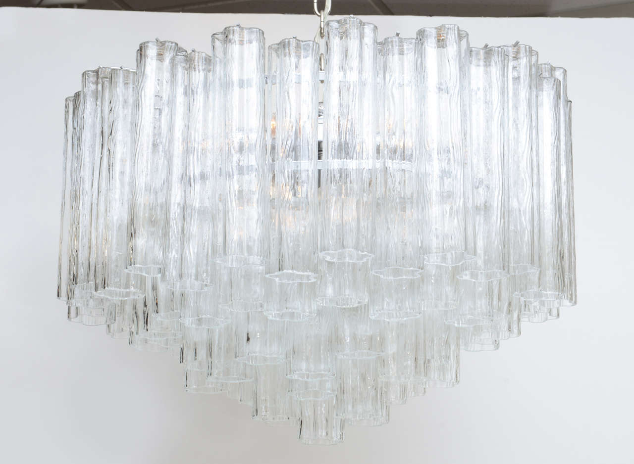SOLD Exquisite and beautiful Murano Tronchi crystal five tier chandelier with 81 mold blown tubular tronchi (tree) crystals and nine medium base light sockets.  Most likely a Camer Glass import. The silvered & chrome frame is well made and heavy,