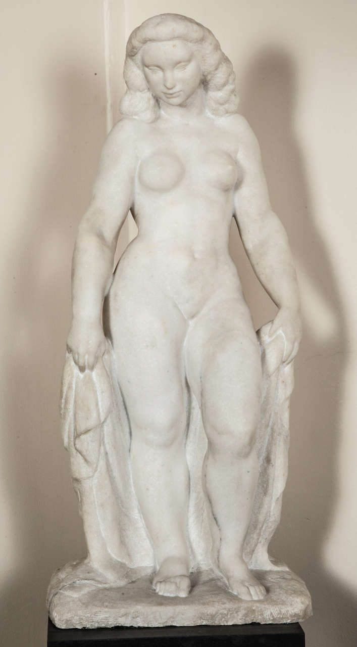 White marble sculpture of a naked standing woman by Pierre  TRAVERSE (1892-1979)
Signed on base.