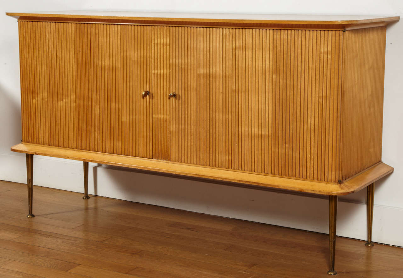 Refined lemontree sideboard attributed to Jacques Dumond (1906-88), circa 1950.
Two 