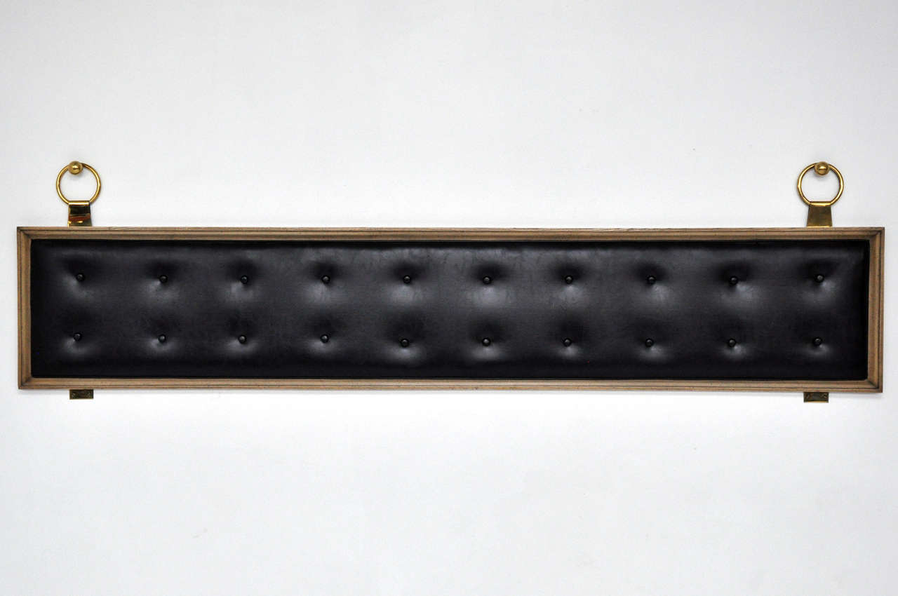 King size headboard with brass ring details.

**2 headboards available.