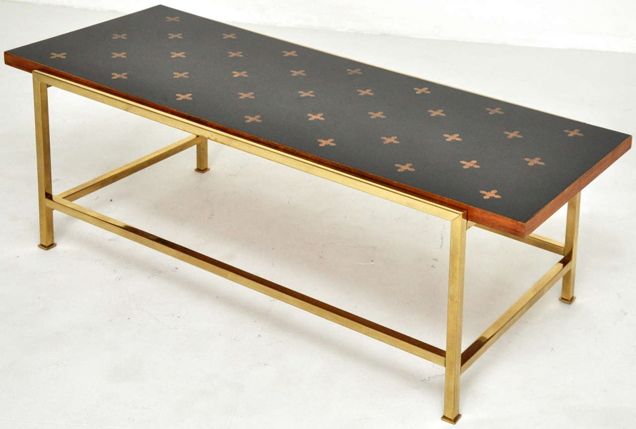Rare parquetry top coffee table over brass frame.  Designed by Edward Wormley.  Lacquered wood with walnut inlaid parquetry design.