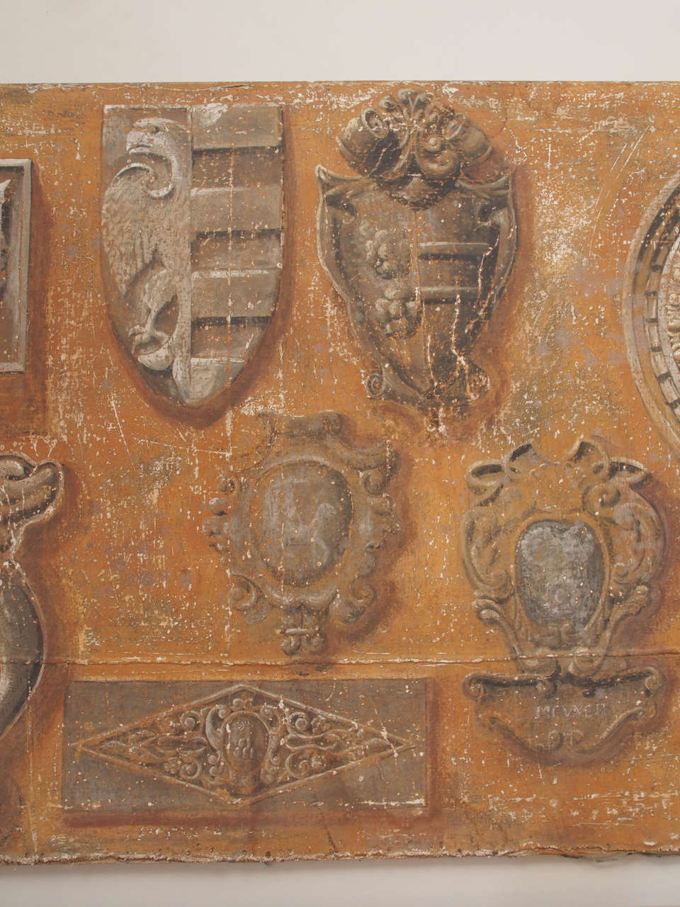 Large Antique Painting of a Mounted Collection of Stone Fragments and Emblems In Fair Condition In New Orleans, LA