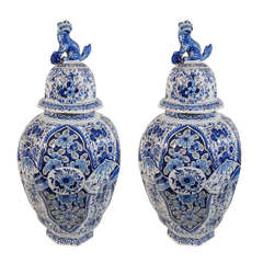 A Pair of Large Blue and White Dutch Delft Covered Vases