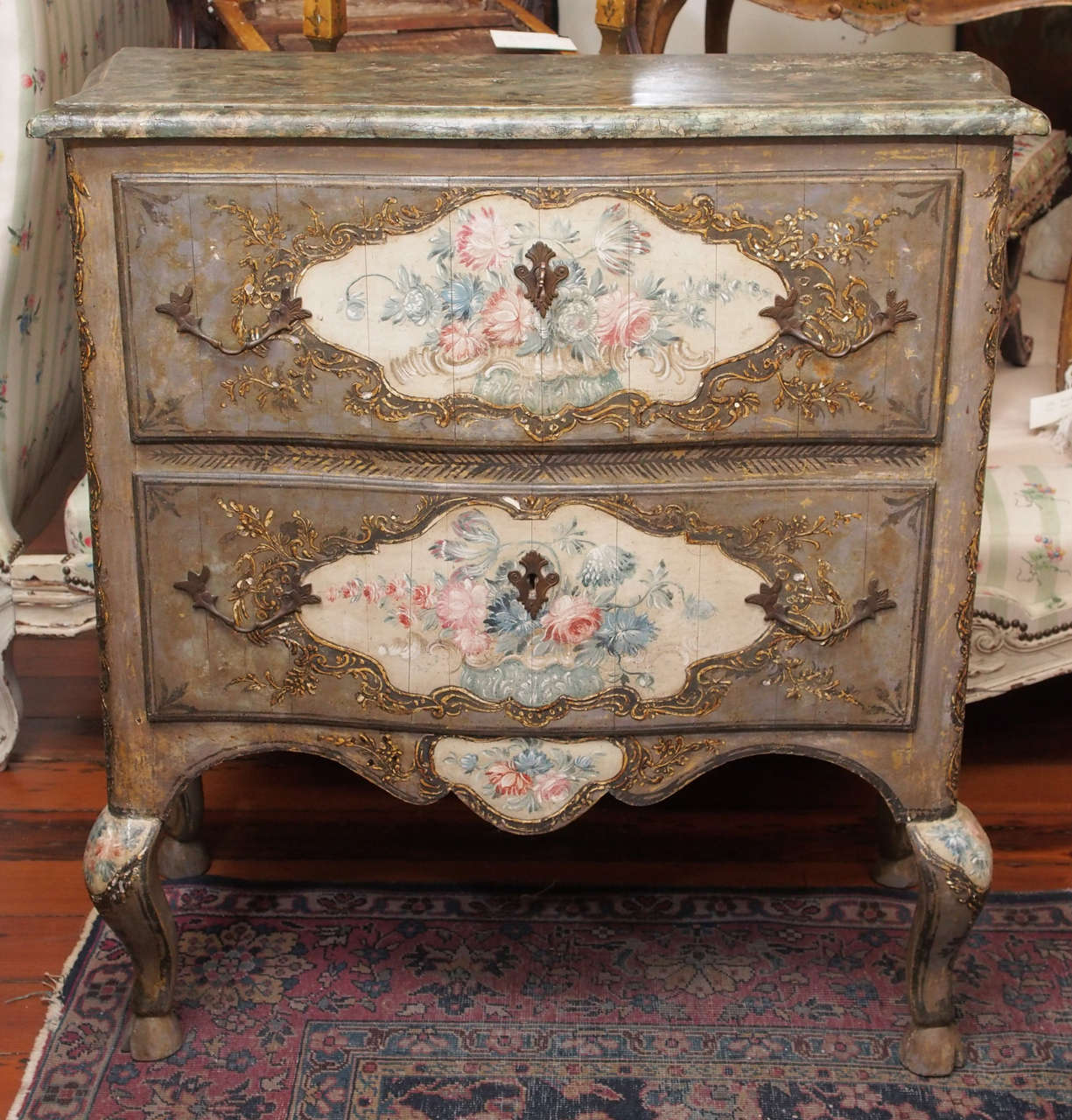 Sicilian Paint Decorated Pastiglia Two Drawer Commode with taupe/gray with floral central medallions all on four hoof footed legs. 18th c.