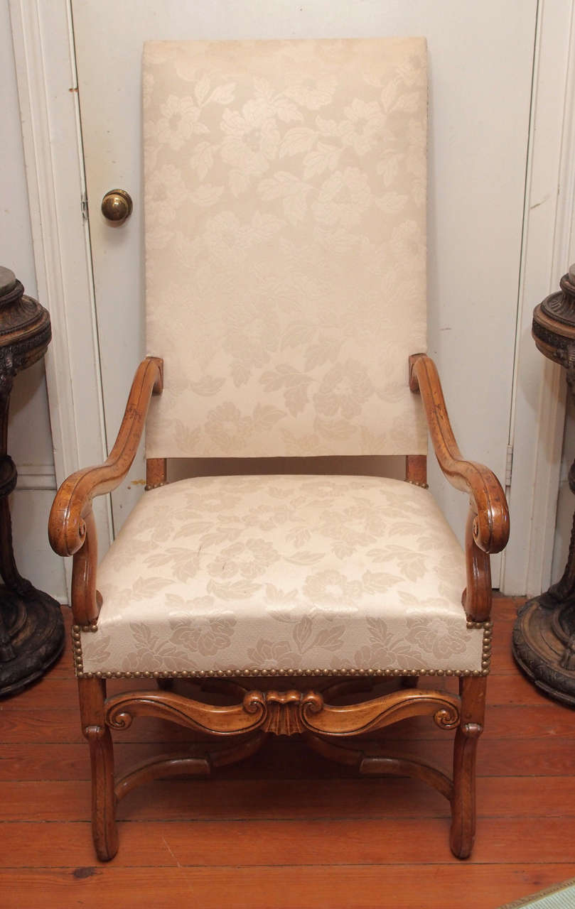 Pair of Early 18th c. Tall Back Chairs of honey colored fruitwood of great proportion. The canted backs are extreme as well as the commodious proportions of the seats and arms