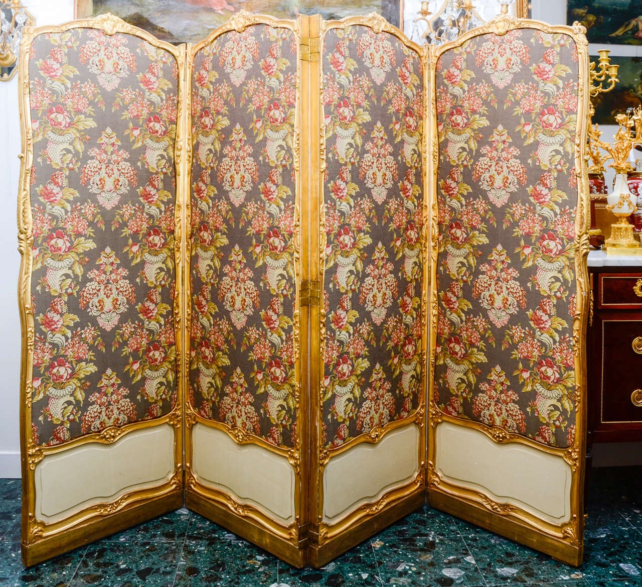 gilded, painted  wood and upholstried screen with 4 leaves.