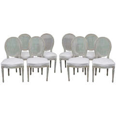 Eight 19th Century French Painted Dining Chairs with Cane Backs