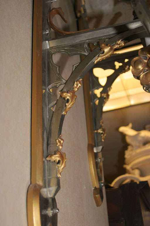 Highly Unusual Pair of Steel and Gilt Bronze Mixed-Style Sconces For Sale 1