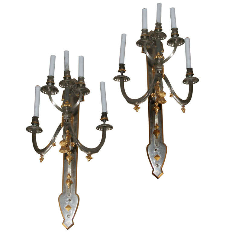 Highly Unusual Pair of Steel and Gilt Bronze Mixed-Style Sconces For Sale