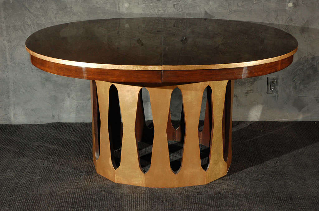 Beautiful dining table or entrance table in Rosewood with 22K gold leaf detailing and diamond base. Two leaves included as extensions that opens up to 90 inches with 2 leaves at 17 inches each.