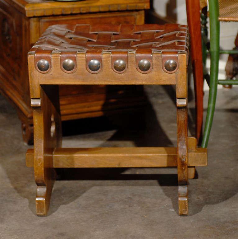 20th Century Spanish Woven Leather Top Stool with Trestle Base and Pierced Motifs For Sale