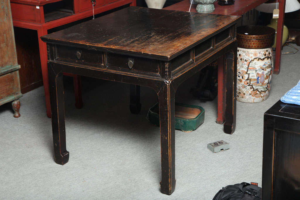 Elmwood hall table with original worn black lacquer. Two drawers at each end. Shanxi, China, 19th c.