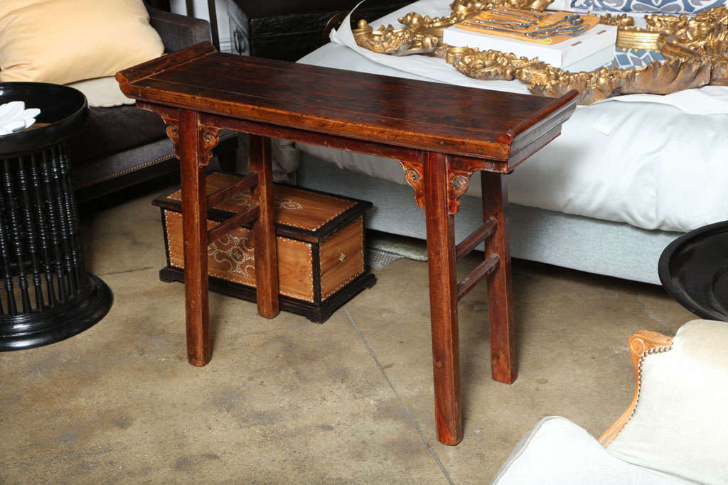 A Ming style altar table with everted ends, in cypress wood, early 19th Century, from Suzchou.