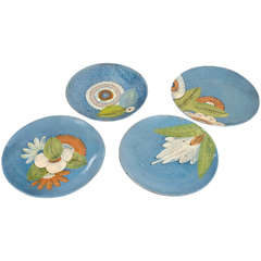 Vintage A Set of Four Painted Plates