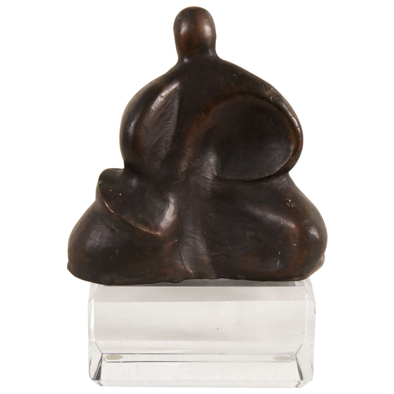 A Sculpture of a Seated Figure