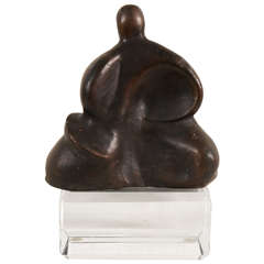 A Sculpture of a Seated Figure