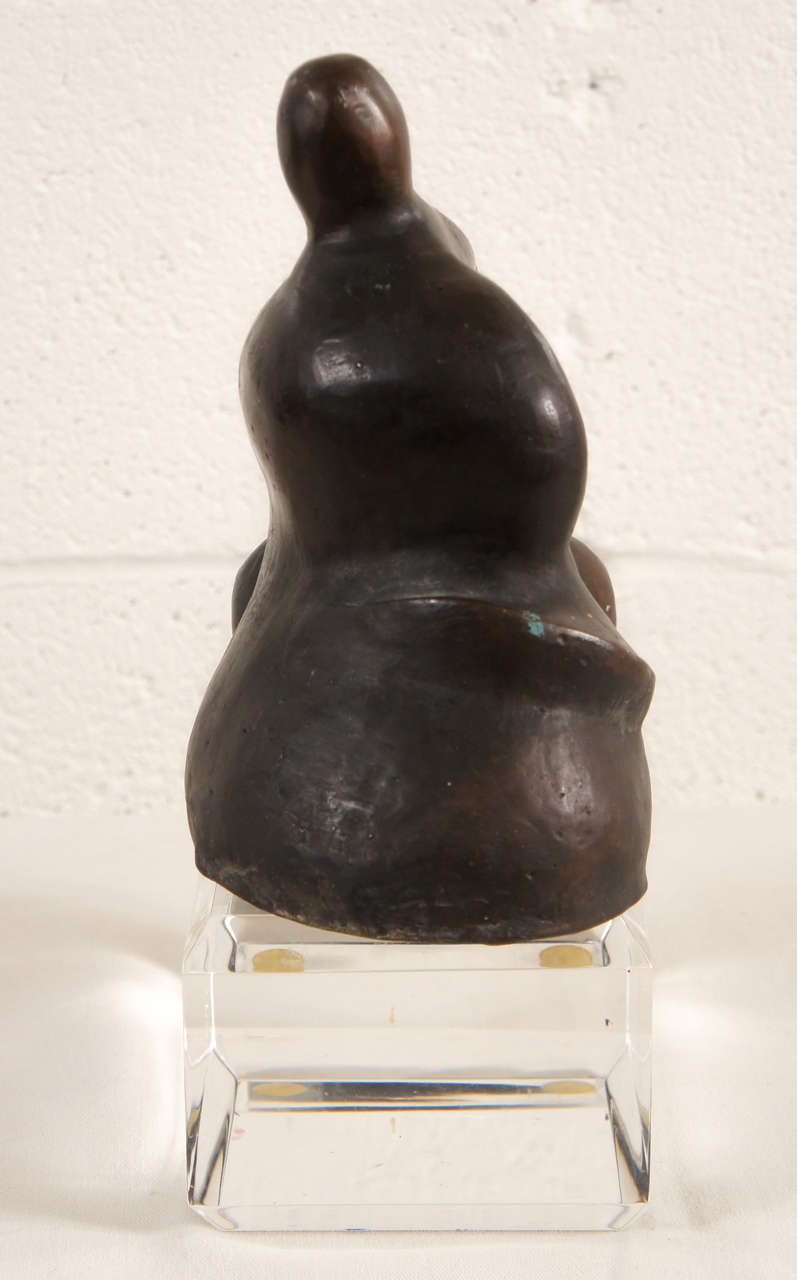 Unknown A Sculpture of a Seated Figure