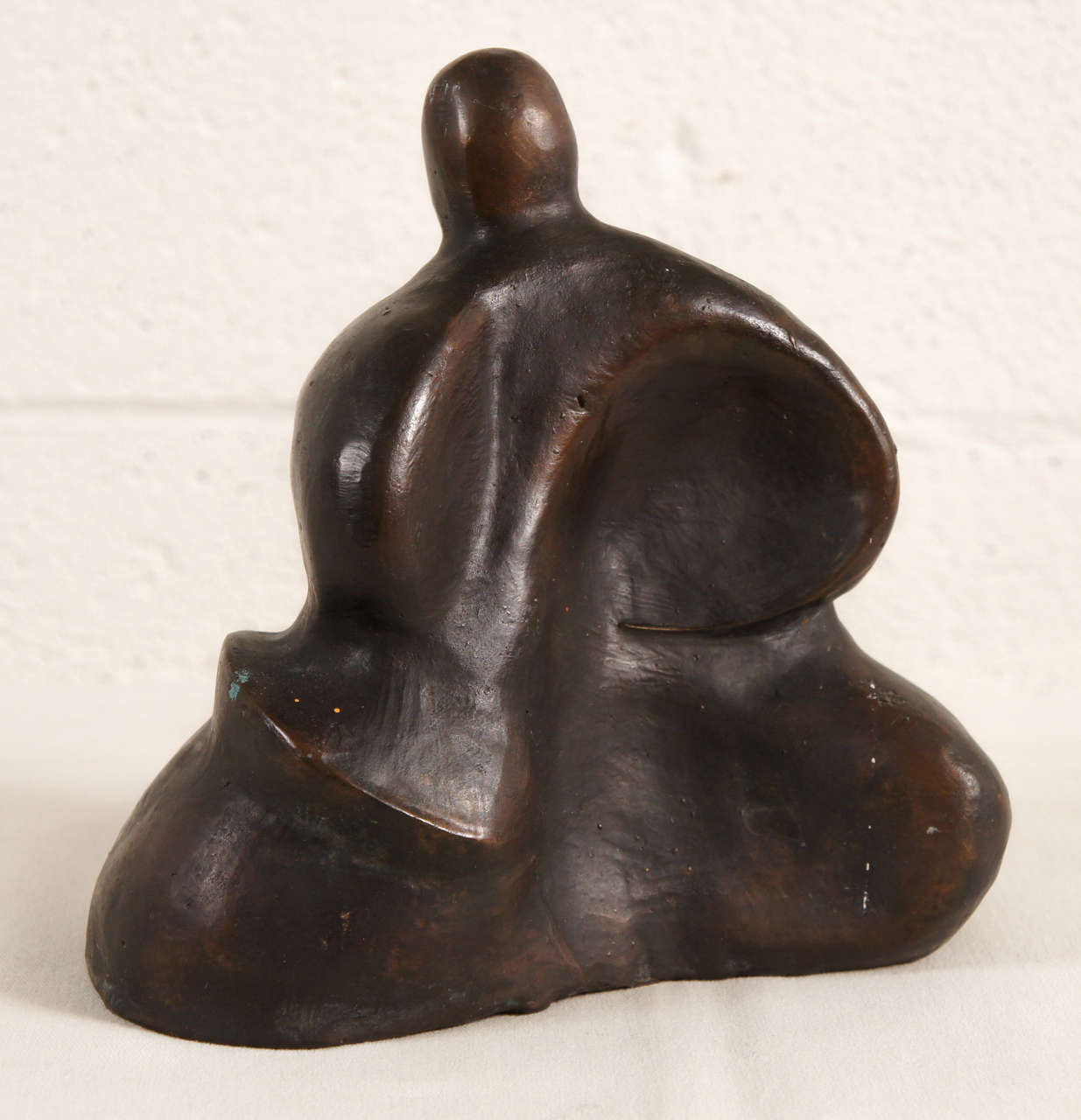 A Sculpture of a Seated Figure 3