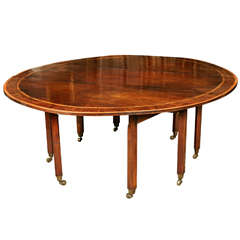 Large Circular Table with Detachable Leaves