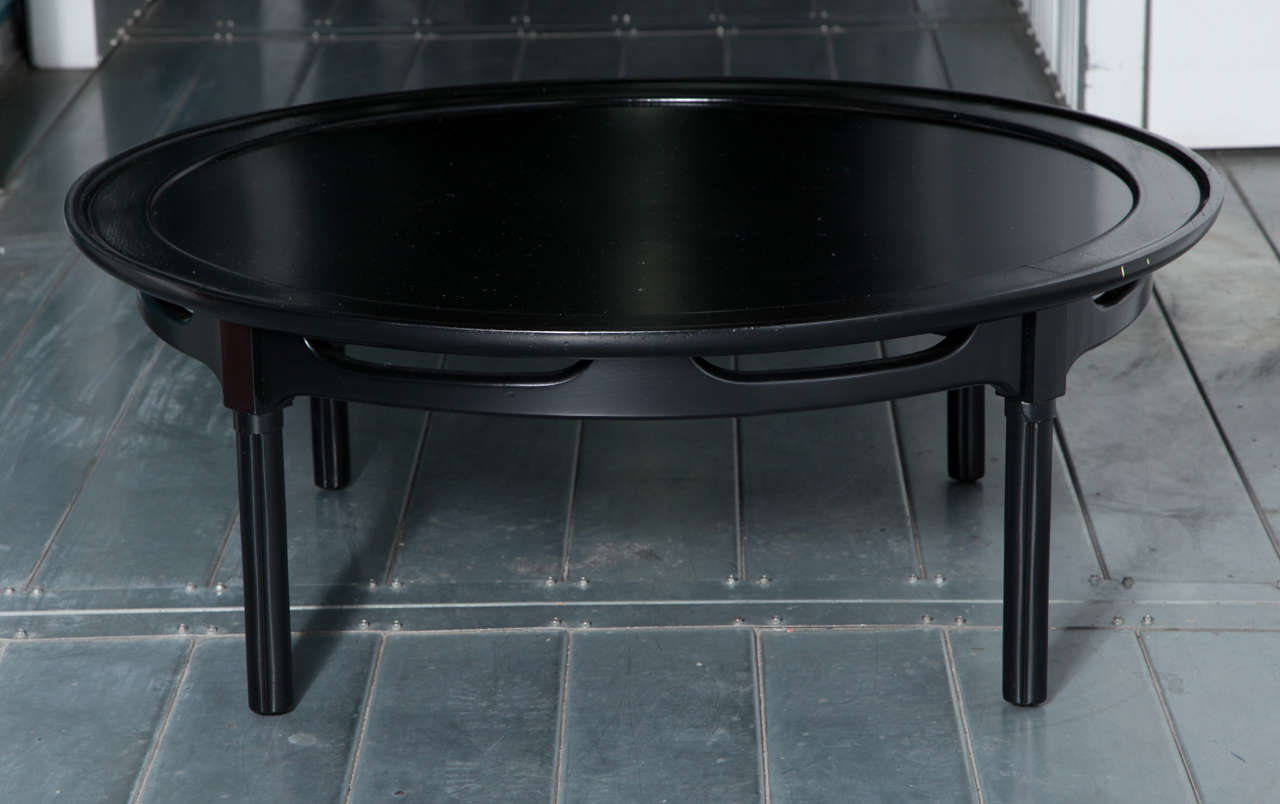 A 1960's Asian-style coffee table similar in design to one by Michael Taylor for Baker Furniture. The black stained finish has been refreshed. A little Danish Modern meets Palm Beach.