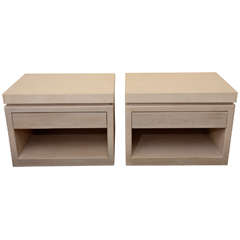Pair of bleached oak end cabinets with travertine tops