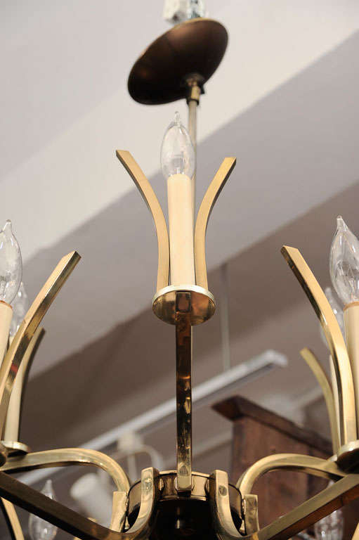 9 light candelabra style chandelier in brass.

Reduced From: $1,450