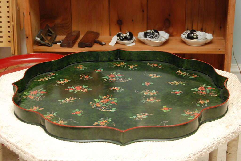 Tole transfer decorated green tray with scalloped rim and charmingly painted<br />
flower decorations